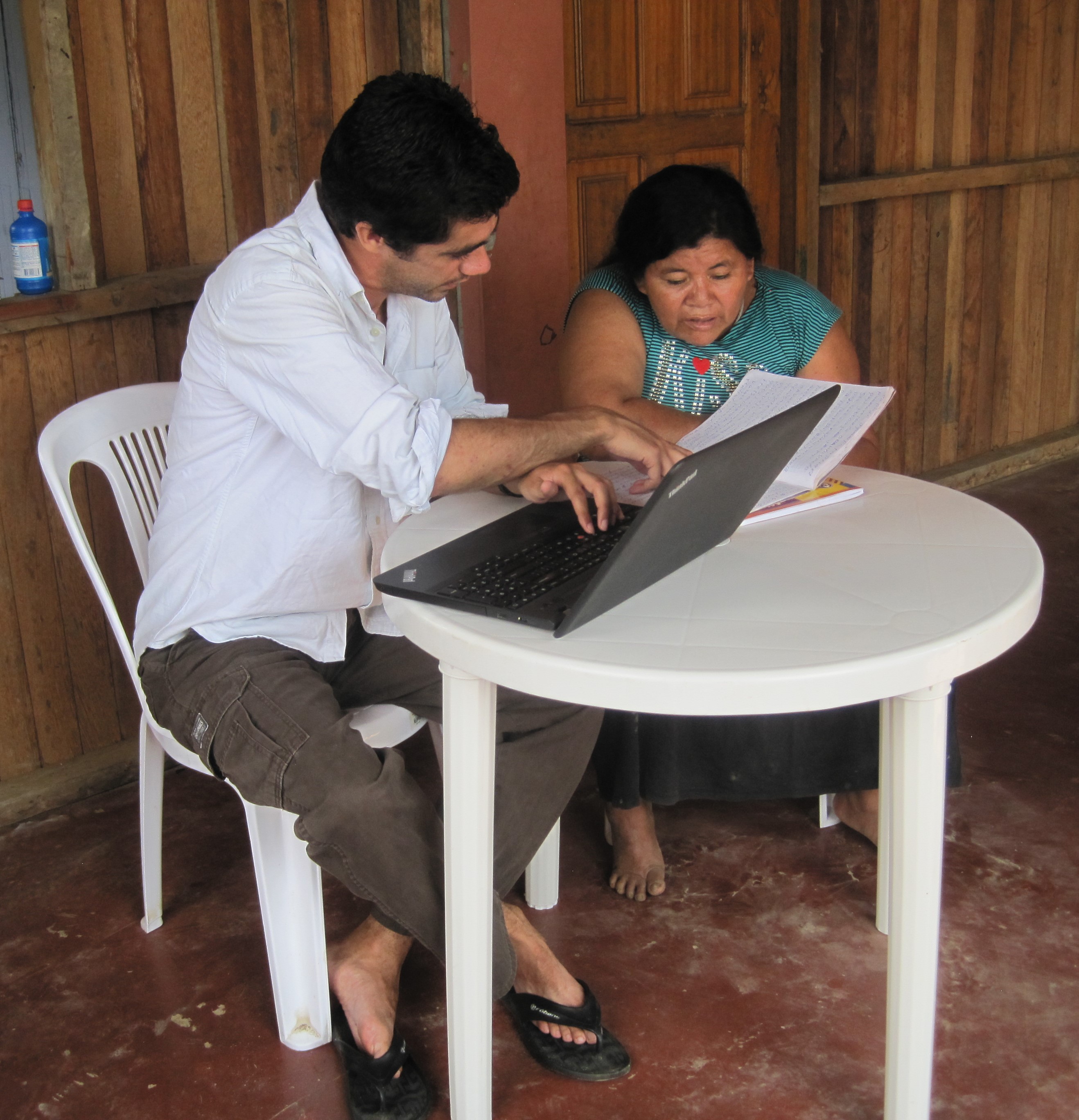 Zachary O'Hagan and Antonina Salazar Torres, reviewing handwritten Caquinte stories, 2016